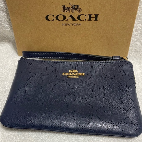 Handbags - Coach wristlet letter signa corner zip
: Length: 6.25"
Height: 4.0"
Width: 0.5"